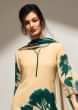 Cream unstithced suit with teal blue floral print all overonly on Kalki