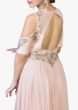 Creamy pink cold shoulder  gown with embroidered armhole, neckline and waist line 