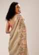 Creme Brulee Saree In Dupion Silk With Multi Colored Bud Embroidered Floral Buttis And Heavy Pallu Design  