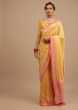 Dandelion Yellow Traditional Georgette Saree With Contrasting Peach Brocade Border And Jaal Work 