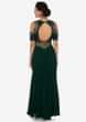 Dark green gown in georgette crafted in resham and zari embroidered work
