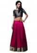 Deep pink skirt matched with crop top brocade blouse only on Kalki