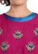 Fancy Asymmetric Kurti In Rani Pink With Embroidered Butti Online - Kalki Fashion