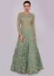 Fern green net embroidered gown with floral embroidered jaal work 