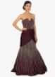 Fish tail strapless violet satin net gown with pleated cowl drape