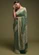 Forest Green Banarasi Saree In Georgette With Woven Buttis And Zardozi Work  