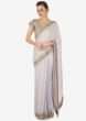Frost grey saree in satin crepe with thread and kundan border only on Kalki