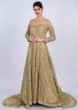 Golden beige sequins embroidered net gown with trail at the back only on Kalki