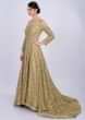 Golden beige sequins embroidered net gown with trail at the back only on Kalki