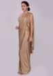 Golden wrap around shimmer lycra saree with multi color sequins net blouse
