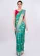 Green and blue color brocade saree only on Kalki