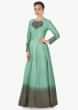 Green and grey raw silk anarkali suit embellished in thread and cut dana work only on Kalki