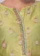 Green cotton silk palazzo suit set with net dupatta