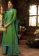 Green cotton silk unstitched suit paired with floral weaved bottoms and chiffon dupatta with brocade border