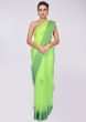 Green organza saree in resham and french knot embroidered butti 