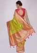 Green silk saree with weaved butti and brocade border