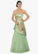 Green strapless satin net gown  along with a fancy wrap around 