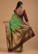 Green Two Toned Pure Handloom Saree In Silk With Woven Text Motifs And Purple Border  