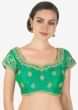 Green shaded lehenga matched with ready blouse