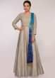 Grey anarkali dress paired with a blue shaded bandhani printed dupatta