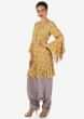 Grey and yellow printed suit adorn in moti with fancy pants only on Kalki