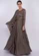 Grey beige gown with one side flared sleeves only on Kalki