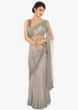 Grey net saree in sequins and moti 