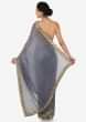 Grey georgette saree with unstitched blouse adorn in heavy cut dana work only on Kalki