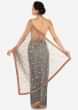 Grey saree in net adorn in 3D flower embroidery along with cut dana work only on Kalki
