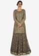 Grey skirt suit in silk heavily embellished in resham and sequin embroiderery work only on Kalki
