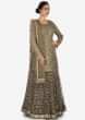 Grey skirt suit in silk heavily embellished in resham and sequin embroiderery work only on Kalki