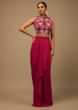 Hot Pink Draped Dhoti Skirt And Crop Top With Multi Colored Resham Flowers And Moti Highlights