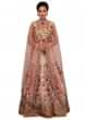 Ice pink lehenga in raw silk with floral motif hand embroidery only on Kalki