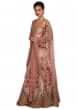Ice pink lehenga in raw silk with floral motif hand embroidery only on Kalki