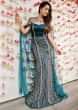 Tridha Choudhary in kalki teal green strapless fish cut gown with long net cape 