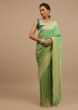 Island Green Saree With Jaal Work On The Border And Pallu