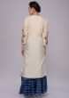 vory white suit with center embroidered butti with cobalt blue sharara and dupatta 