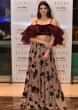 Ihana Dhillon in Kalki maroon ruffled bustier teamed with tan brown floral printed skirt