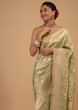 Kalki Lily Green Saree In Pure Banarasi Silk With Upada Zari Weave Floral Jaal Work