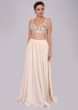 Lace pink pleated skirt and matching bustier paired with long embroidered net jacket