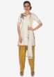 Cream And Yellow Salwar Suit Embellished In Zardosi And Cut Dana Butti Online - Kalki Fashion