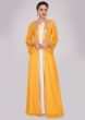 Light cream georgette tunic dress paired with fire yellow long jacket with embroidered edges