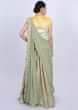 Light green weaved skirt with embroidered blouse and prestitched lycra dupatta only on Kalki