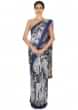 Light grey saree in abstract human face print all over only on Kalki
