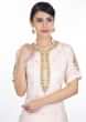 Light peach gotta patch embroidered suit paired with matching palazzo and chiffon dupatta