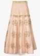 Light peach lehenga matched with velvet blouse adorn in zari and tassel embroidery only on Kalki