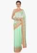 Light pista green saree in satin chiffon with zari and cut dana embroidered butti and border only on Kalki