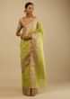 Lime Green Saree In Organza Silk With Woven Moroccan Jaal In Shades Of Silver And Gold Along With Unstitched Blouse  