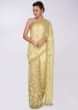 Macaroon tan half and half saree in net and crepe only on Kalki