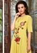 Macaroon yellow cotton suit in floral resham embroidery on the center bodice and waist 
